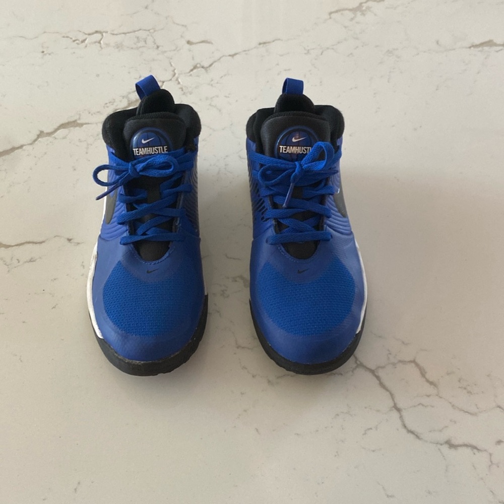 Nike team hustle black blue and white shoes